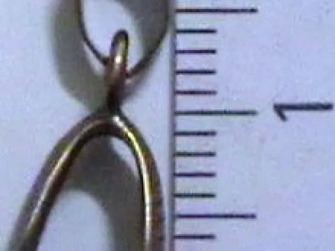 Тримач зажим