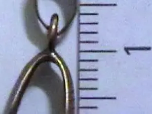 Тримач зажим