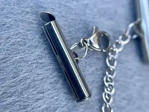 Застібка із затискачем для біжутерії