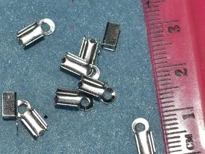 Затискач для шнура