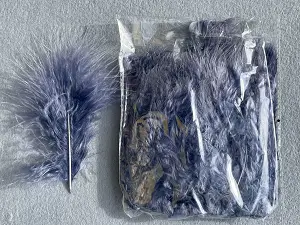 Перо пухнасте