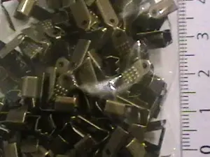 Затискач 0.4мм