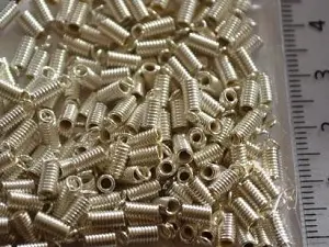 Зажим-кінцевик Пружина