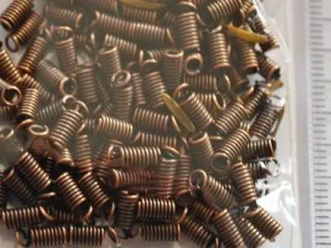 Зажим-кінцевик Пружина