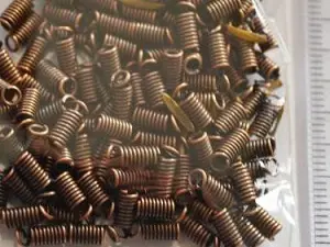 Зажим-кінцевик Пружина