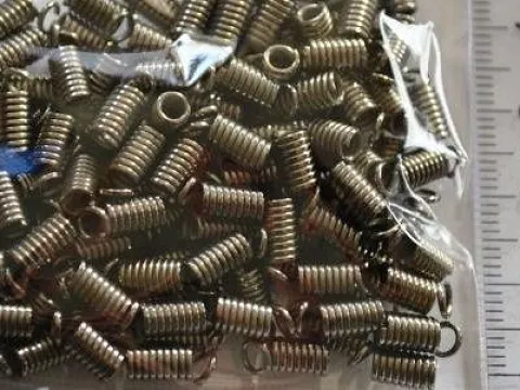 Зажим-кінцевик Пружина