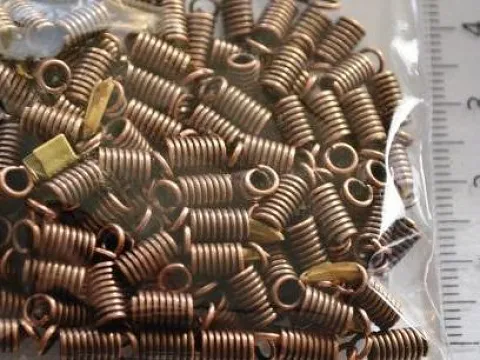 Зажим-кінцевик Пружина