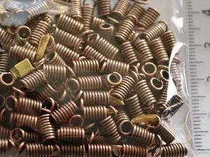 Зажим-кінцевик Пружина