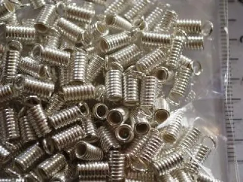 Зажим-кінцевик Пружина