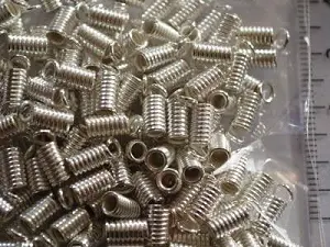 Зажим-кінцевик Пружина