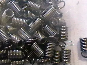 Зажим-кінцевик Пружина