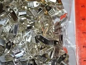 Затискач 0.4мм