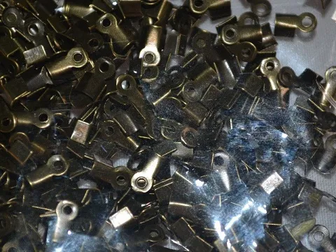 Затискач для шнура