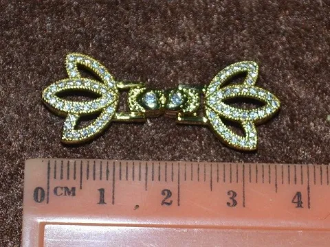 Застібка родованим