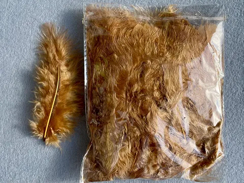 Перо пушистое