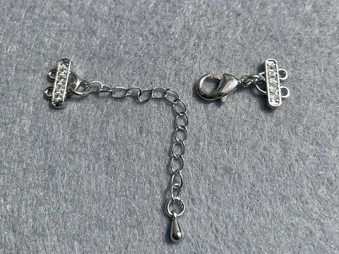 Застібка із затискачем для біжутерії