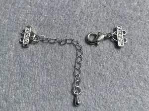 Застібка із затискачем для біжутерії