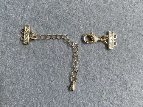 Застібка із затискачем для біжутерії