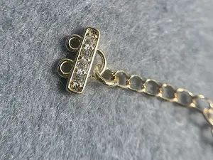 Застібка із затискачем для біжутерії