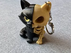 Брелок Скелет-кішка надрукована на 3Д принтері