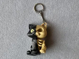 Брелок Скелет-кішка надрукована на 3Д принтері