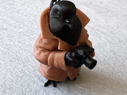 Брелок Голубь с фотоаппаратом напечатан на 3Д принтере.