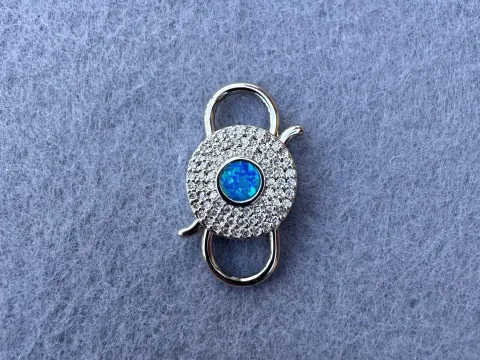 Карабін подвійний з опалом та цирконієм