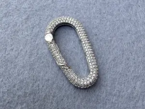 Карабін двосторонній з цирконієм.